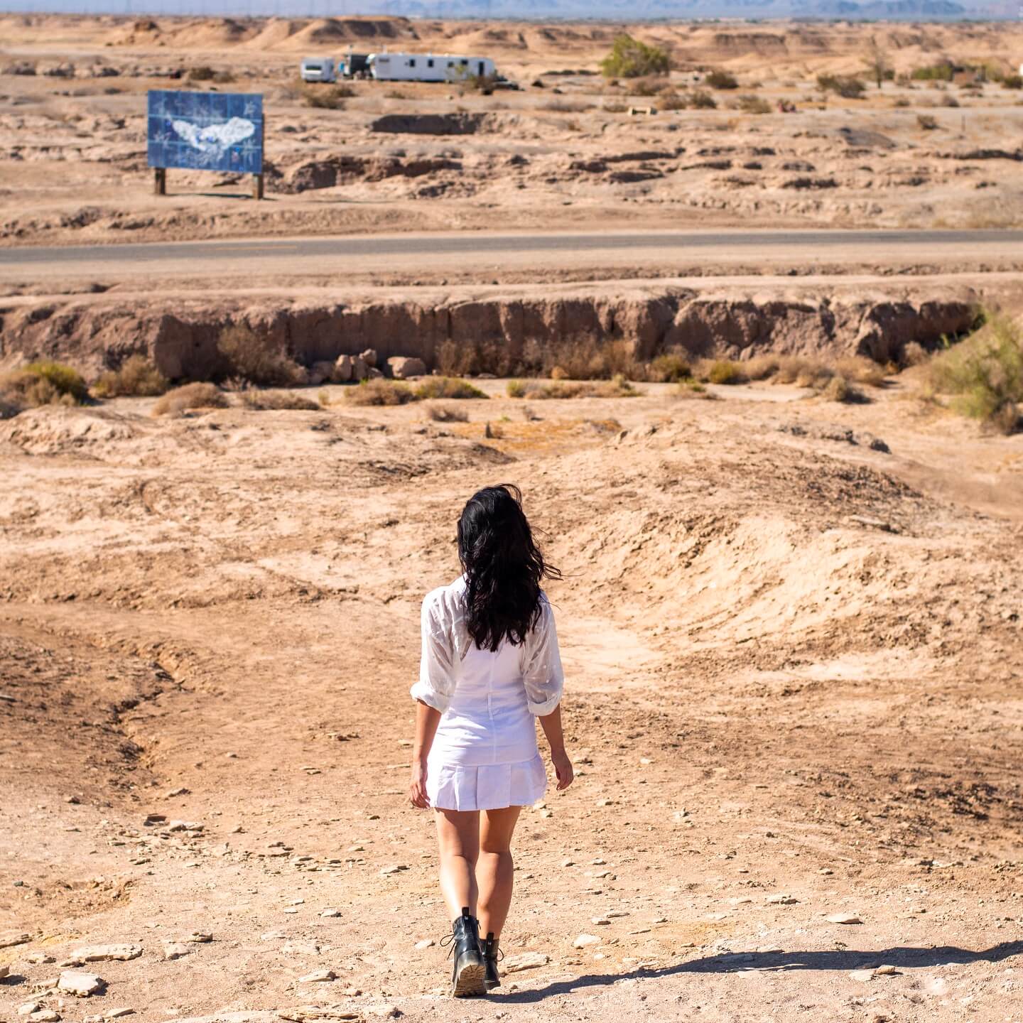 Girl walking down from the salvation mountain