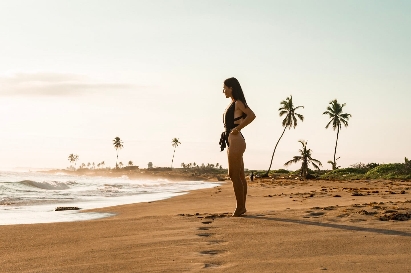 Girl standing on the beach