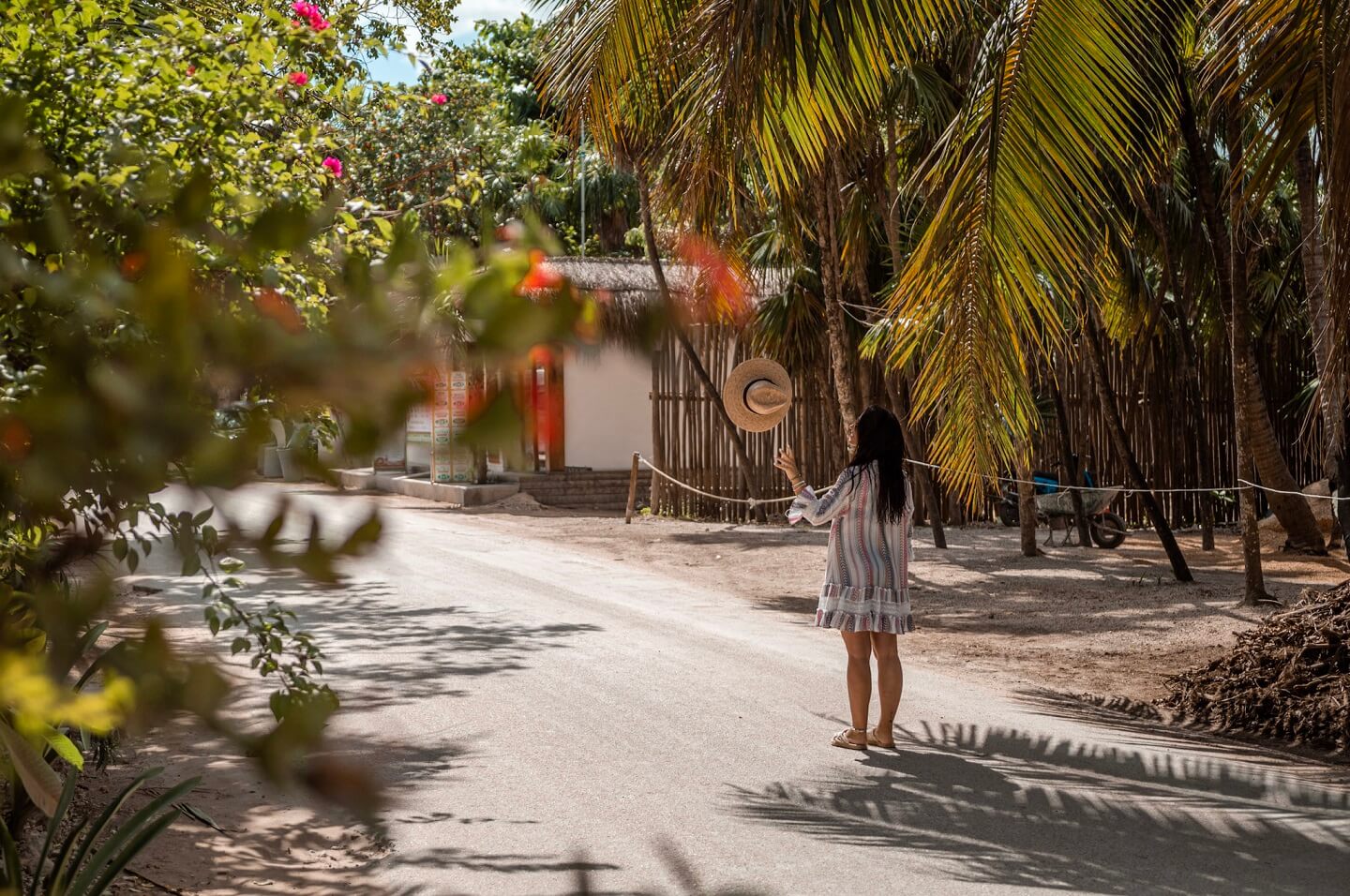 Girl with hat poses in Tulum