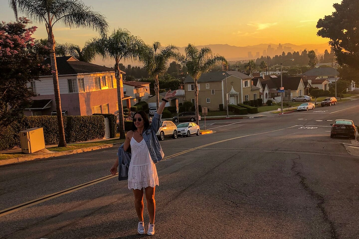 Girl posing in the middle of the road in Los Angeles