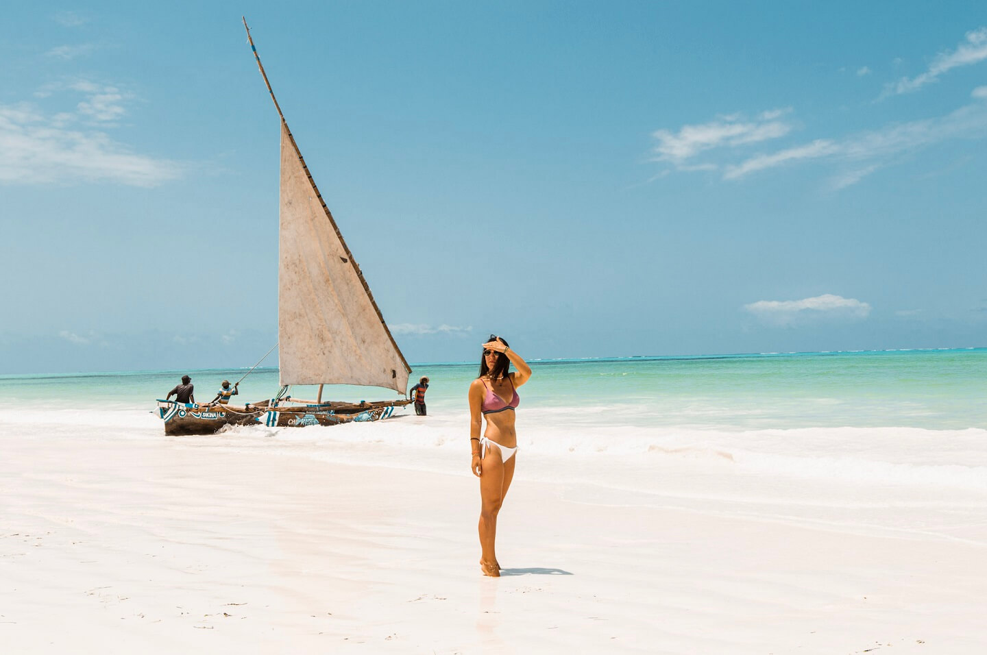 Girl standing in the ocean in the Zanzibar