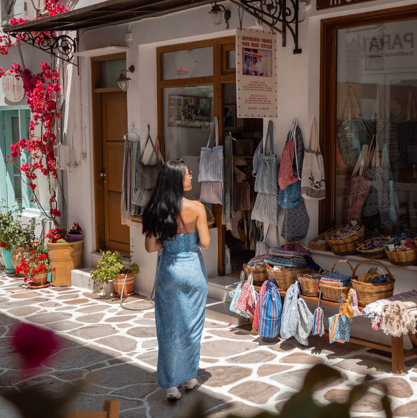 5 days in Naxos. Stella walking around shops.