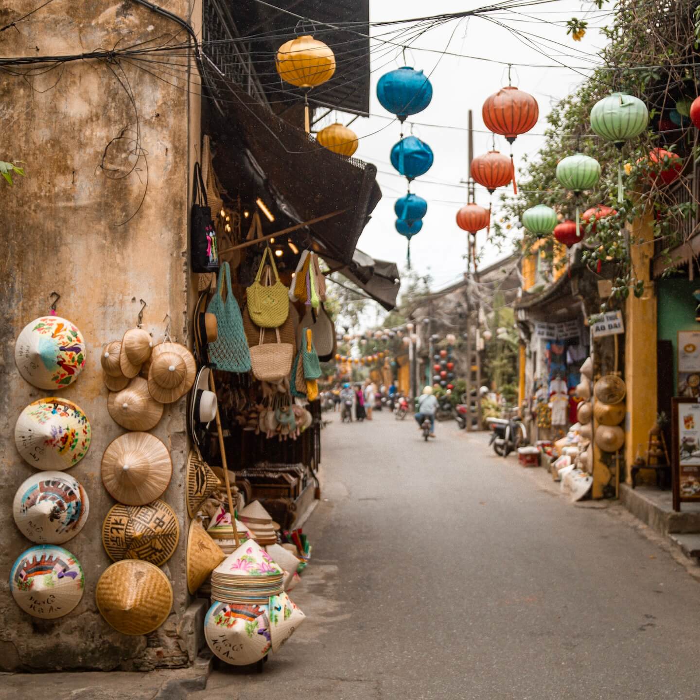 Street in Hoi An with lanterns and souvenir stores