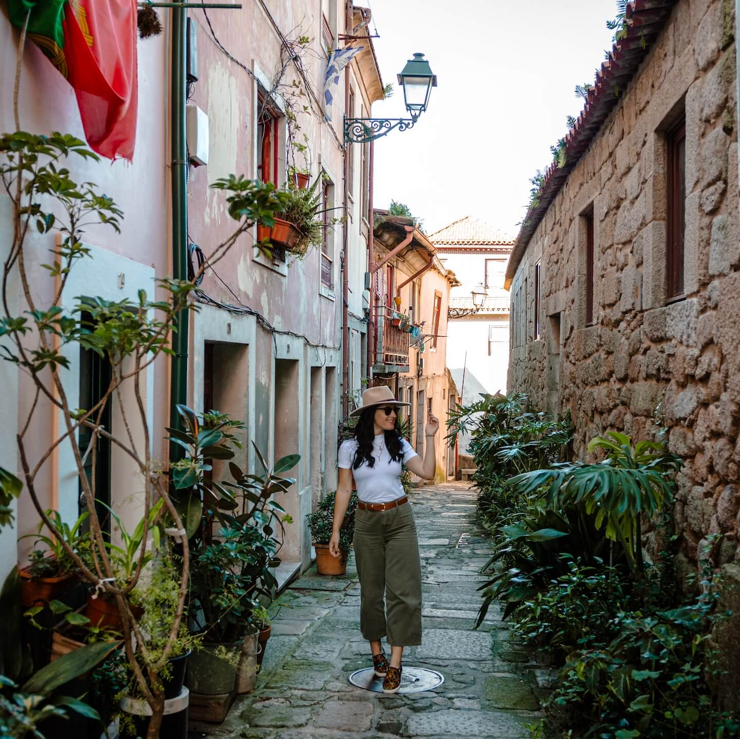 Stella walking in narrow streets in Porto
