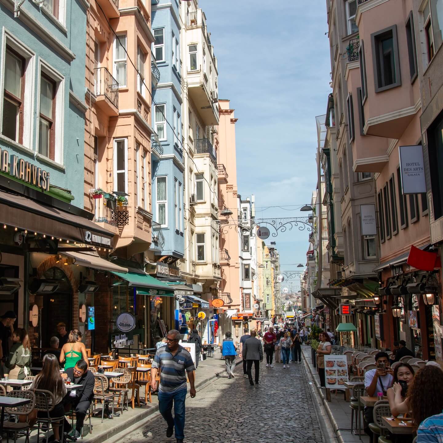 Narrow street with coffee shops in Galata Istanbul